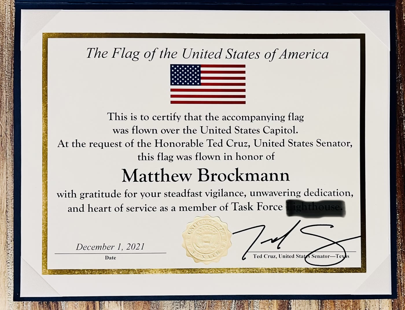Certificate: a flag flown over the United States Capitol in honor of Matthew Brockmann, at the request of Senator Ted Cruz, December 1, 2021